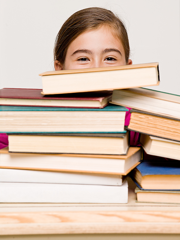 Girl with Stack of Textbooks